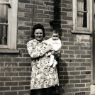 Photo:Ethel Beckwith with daughter Joan at the back door of 86 Tweeddale Road, 1945.