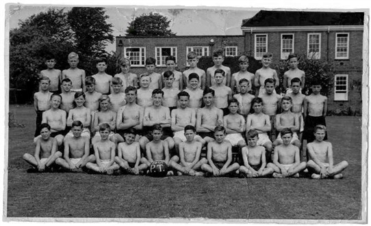 Photo:2nd year gymnastics display team (1950, I was just 13 at the time) Does anyone out there recognise themselves in the picture? I am front row sitting 2nd from the left, next to Len Hawkins..
